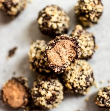 These easy rum truffles are vegan, gluten-free, and make a fun little no-bake treat that's perfect for the holidays. 