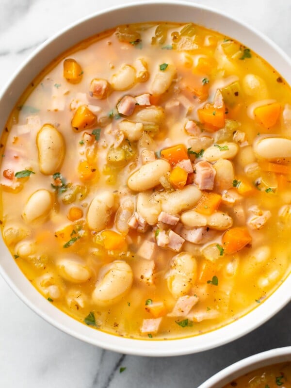 ham and bean soup (close-up in a white bowl)