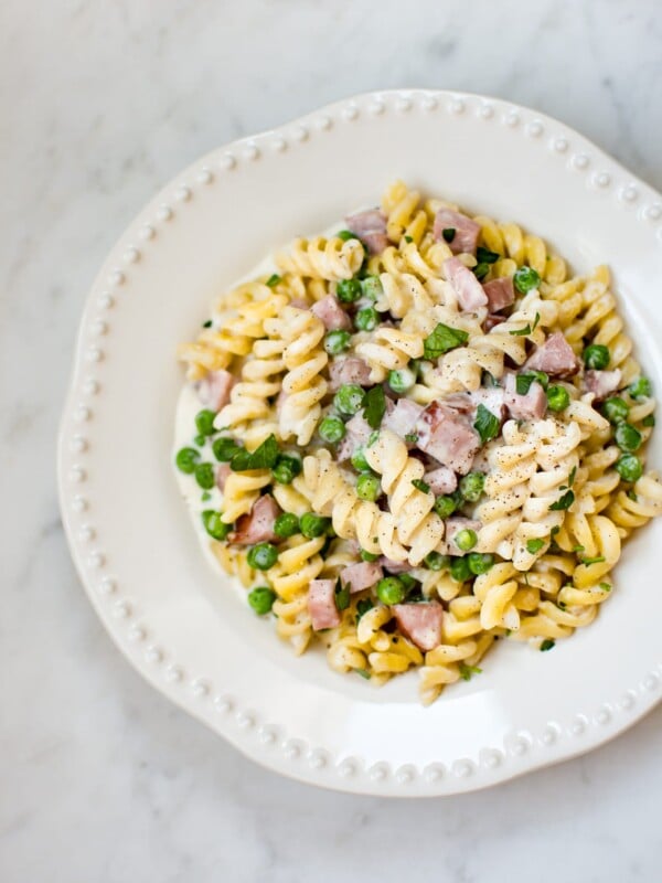 This one pot ham and pea pasta recipe is quick, simple, and a perfect way to use up leftover ham from the holidays!