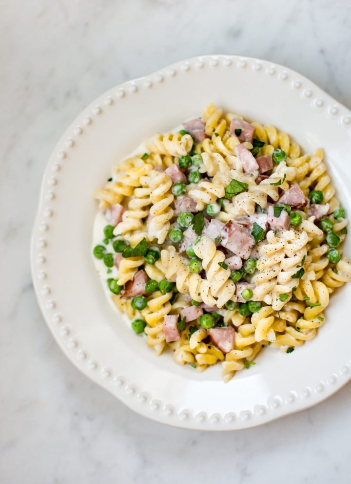 This one pot ham and pea pasta recipe is quick, simple, and a perfect way to use up leftover ham from the holidays!