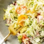 a bowl of italian chopped salad with fork