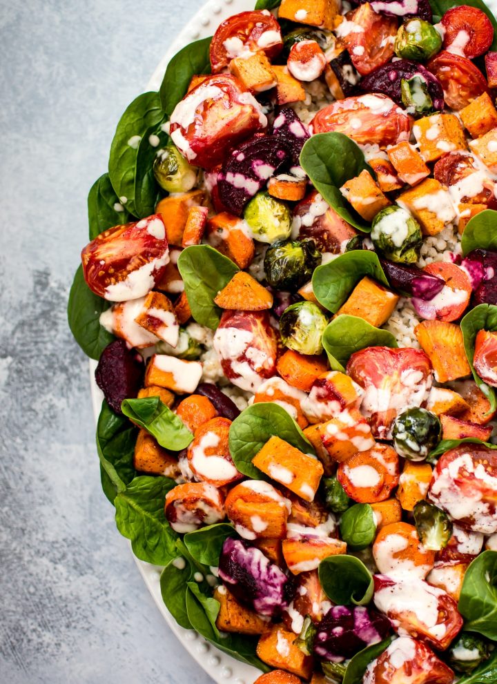 This roasted vegetable salad with barley doubles as a vegan meal prep idea! Topped with a delicious maple tahini dressing, it makes a healthy and satisfying light meal.