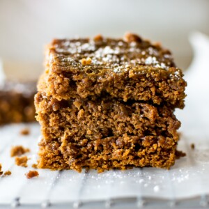 These vegan gingerbread bars are sweet, sticky, easy to make, and wonderfully festive. 