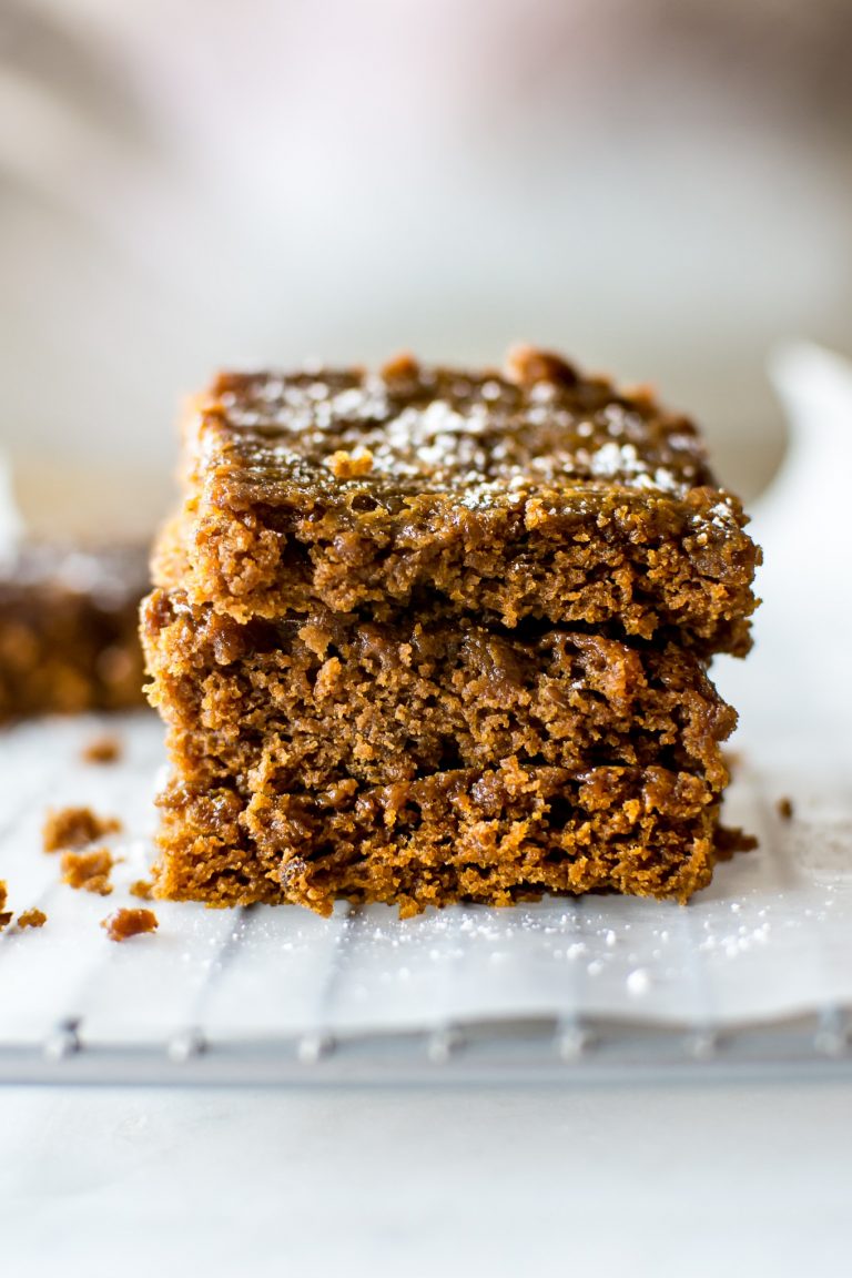 These vegan gingerbread bars are sweet, sticky, easy to make, and wonderfully festive. 