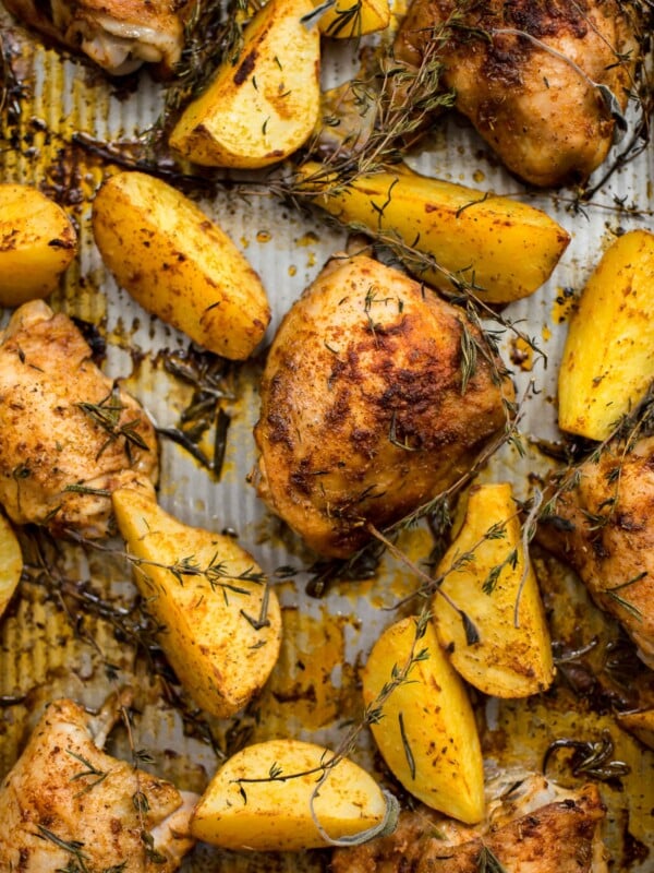 This sheet pan baked chicken and potatoes recipe is super easy and makes a delicious and comforting dinner that the whole family will love!