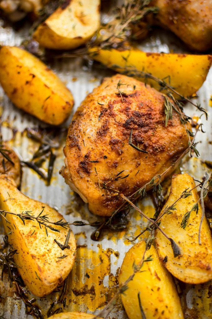 close-up of sheet pan baked chicken and potatoes