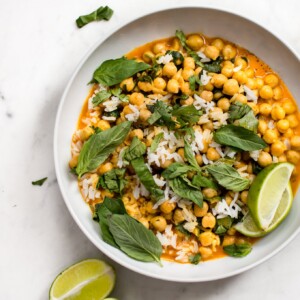 This quick and easy vegan chickpea coconut curry is ready in less than 15 minutes! It's fresh, healthy, and delicious. Great served over rice!