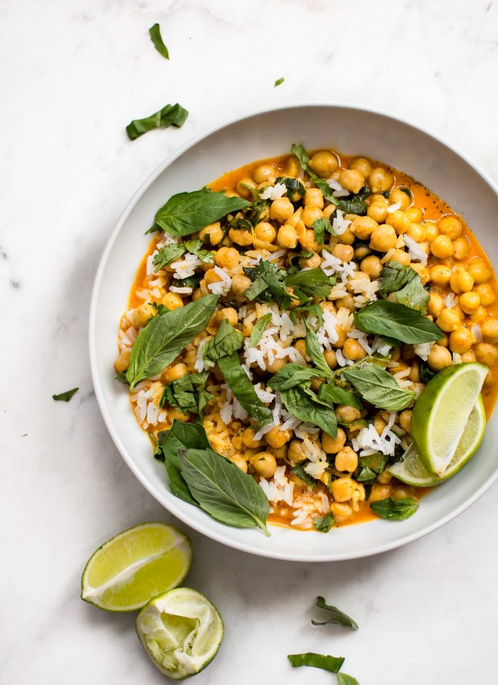 This quick and easy vegan chickpea coconut curry is ready in less than 15 minutes! It's fresh, healthy, and delicious. Great served over rice!