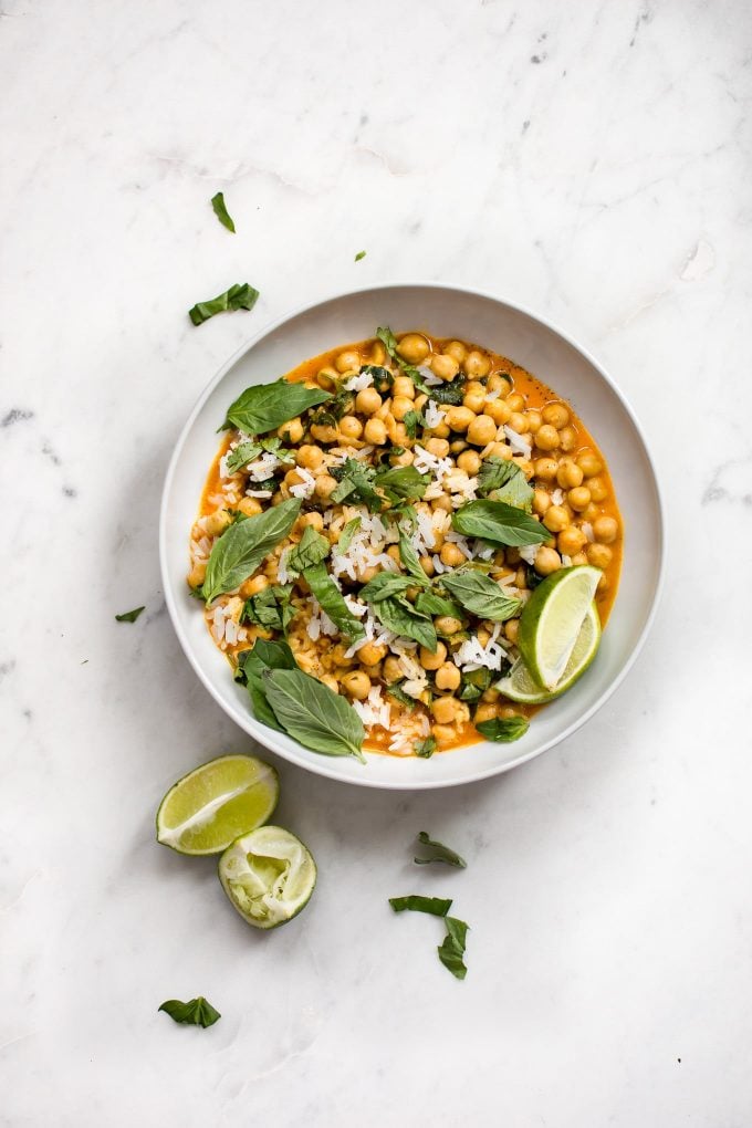 bowl of chickpea coconut curry on a marble surface