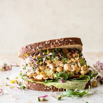 This smashed chickpea salad sandwich recipe is healthy, satisfying, fresh, and delicious! A quick and easy light meal idea.