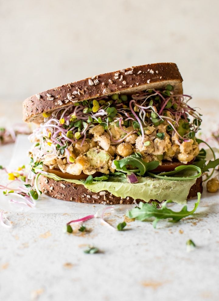 This smashed chickpea salad sandwich recipe is healthy, satisfying, fresh, and delicious! A quick and easy light meal idea.