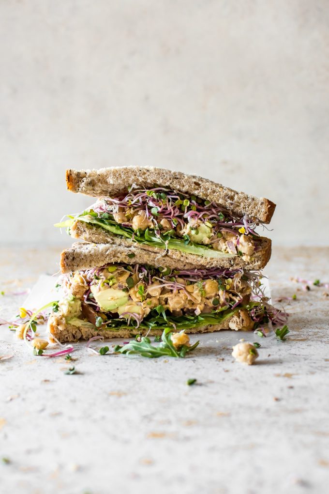 chickpea salad sandwich cut in half and stacked