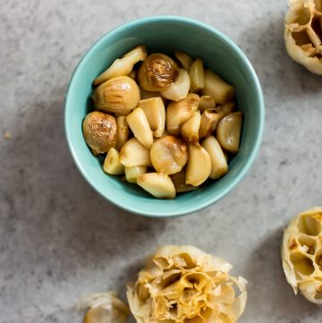Learn how to make perfect roasted garlic with this simple method! Roasted garlic is a great addition to everything from sauces and dressings to homemade hummus.