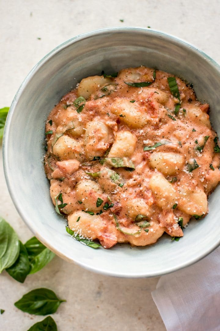 gnocchi alla vodka sauce in a teal bowl