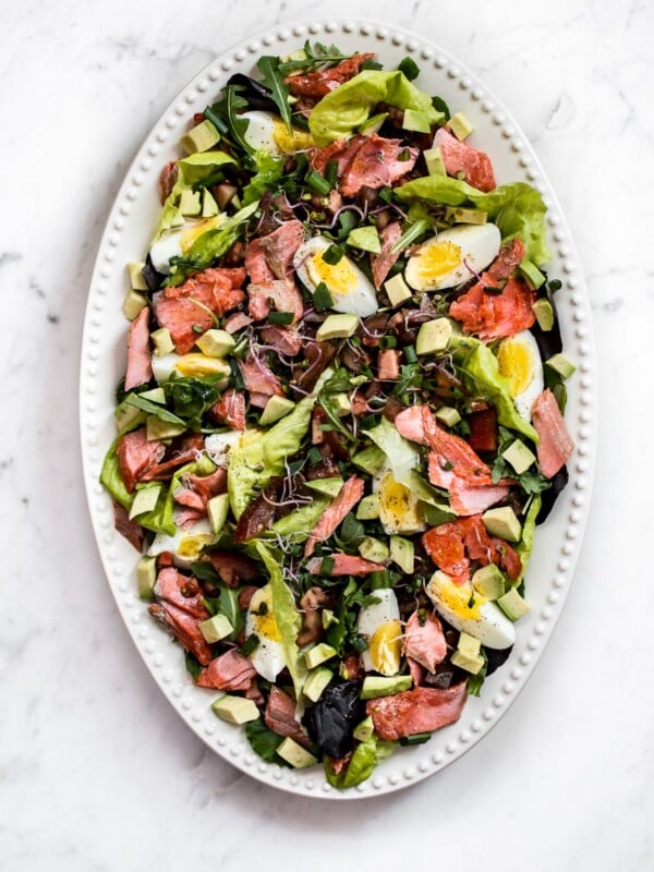 This salmon Cobb salad recipe is a lighter take on the classic! It's every bit as delicious.