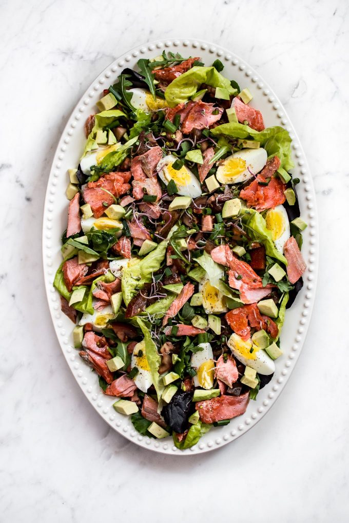 oval serving plate with salmon Cobb salad recipe