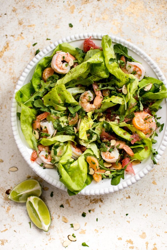 shrimp citrus salad on a white plate