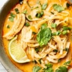 a bowl of thai chicken curry soup