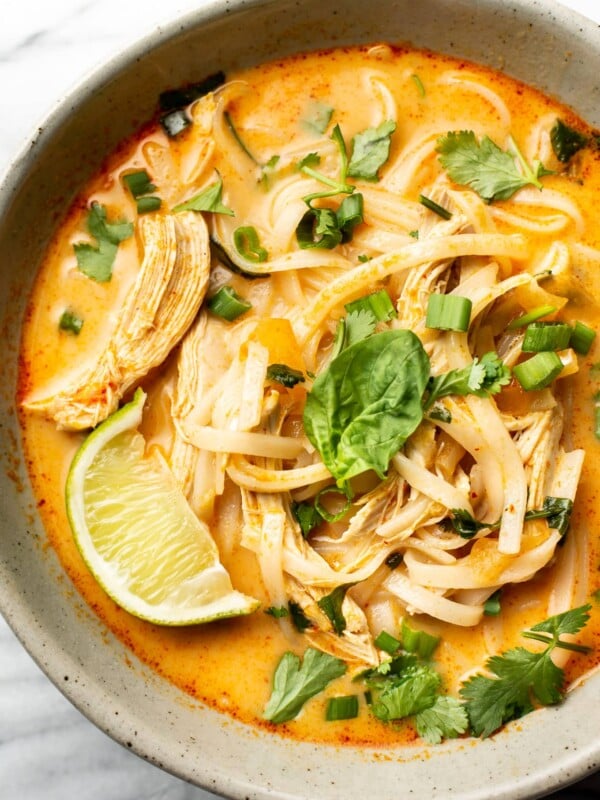 a bowl of thai chicken curry soup