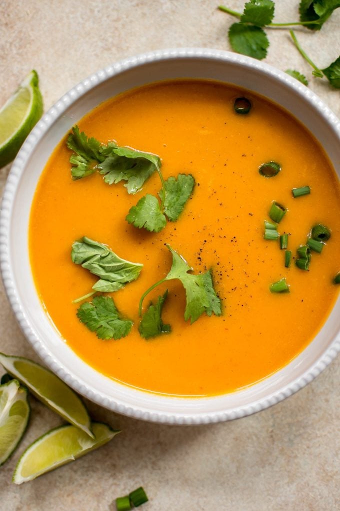 Thai butternut squash soup with coconut milk (close-up of bowl)