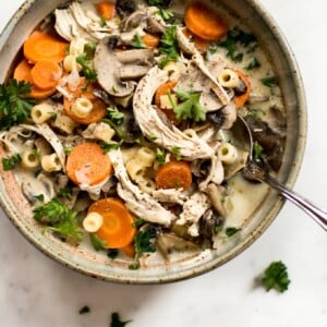 This easy healthy chicken and mushroom soup recipe is hearty and flavorful. It's also a great way to use up leftover chicken and comes together in just over 30 minutes.