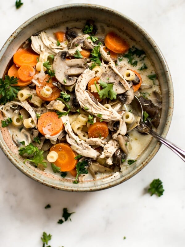 This easy healthy chicken and mushroom soup recipe is hearty and flavorful. It's also a great way to use up leftover chicken and comes together in just over 30 minutes.