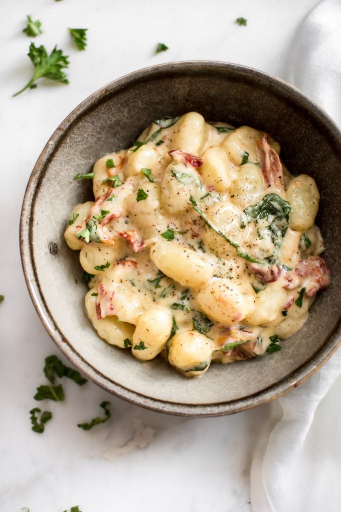 stoneware bowl with creamy sun-dried tomato gnocchi