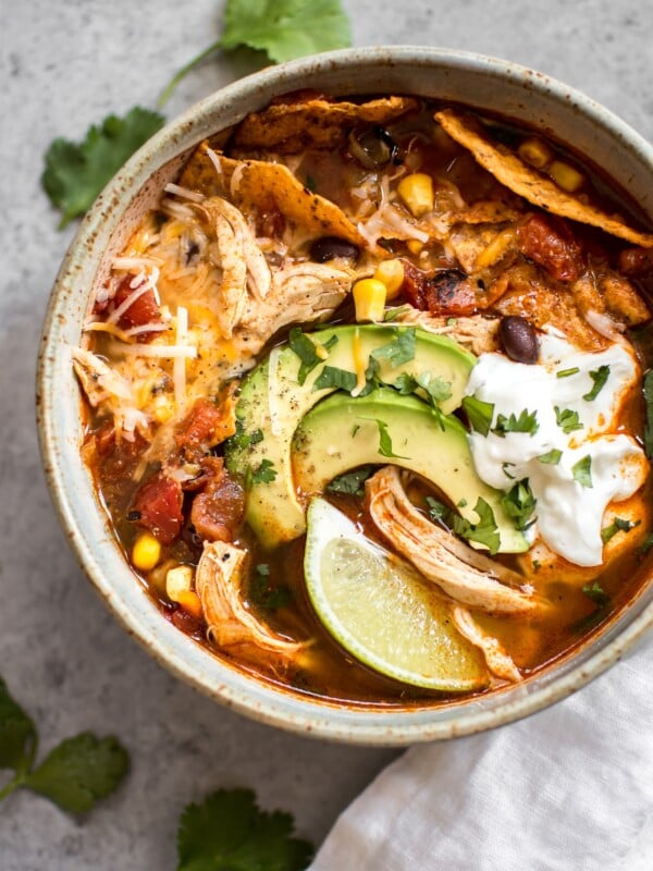 This easy Instant Pot chicken tortilla soup recipe tastes like it's been cooked low and slow, but it's fast and requires minimal effort!