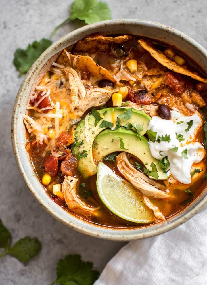 This easy Instant Pot chicken tortilla soup recipe tastes like it's been cooked low and slow, but it's fast and requires minimal effort!