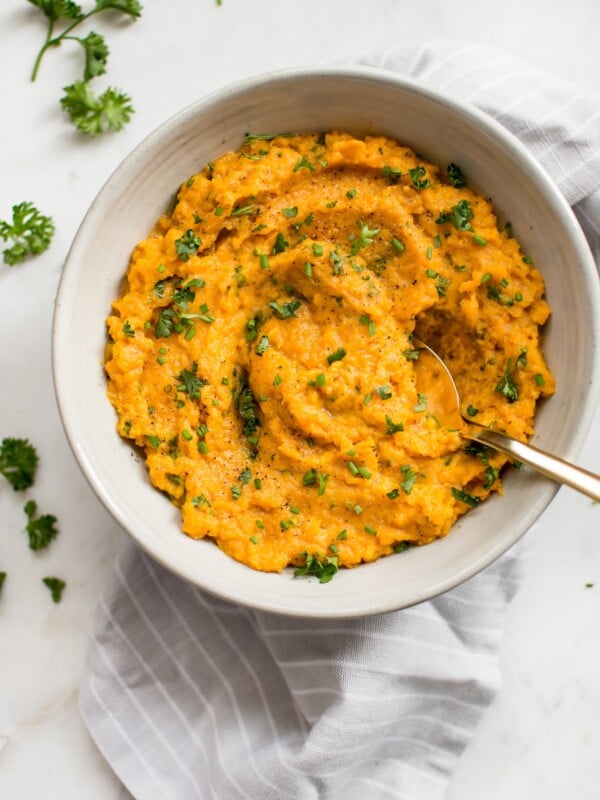 These Instant Pot mashed sweet potatoes are fluffy, creamy, and make the perfect side dish for winter, fall, a special occasion like Thanksgiving or Christmas, or whenever you want a big bowl of comfort!
