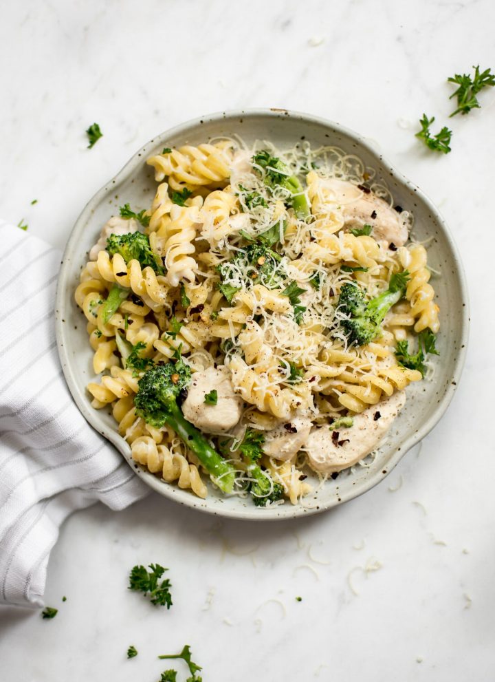 This one pot chicken and broccoli pasta is quick, easy, and you will love the creamy garlic sauce! Ready in 30 minutes.