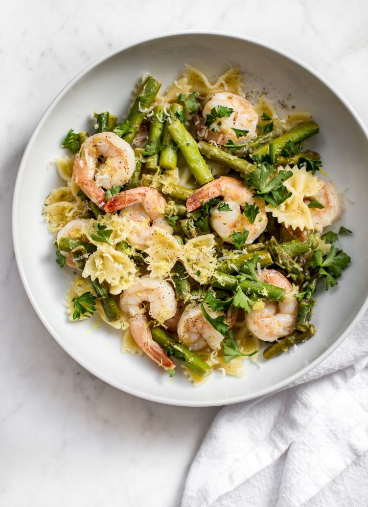 This easy healthy shrimp and asparagus pasta is deliciously lemony, fast, and uses only a handful of ingredients. Ready in 20 minutes!