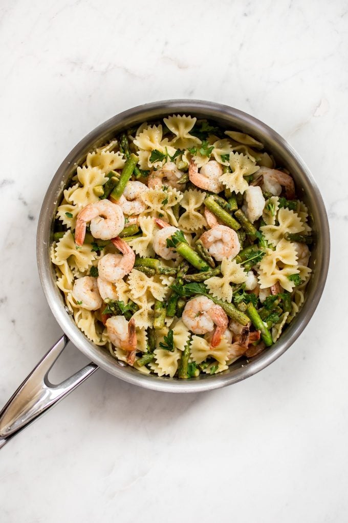 easy shrimp asparagus pasta in a metal skillet