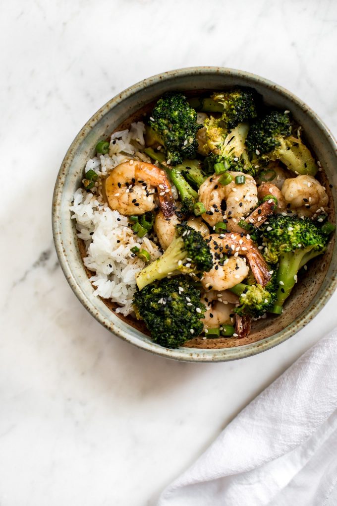 bowl of easy shrimp and broccoli recipe over rice