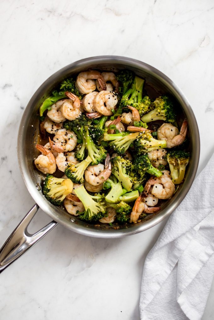 metal skillet with easy shrimp and broccoli recipe