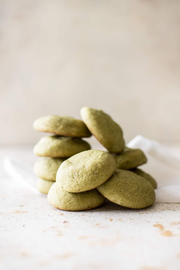 several vegan matcha cookies stacked