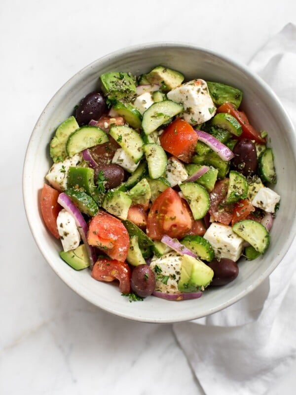 This avocado Greek salad recipe is healthy, fast, and bursting with fresh Mediterranean flavors. This salad is delicious and good for you! 