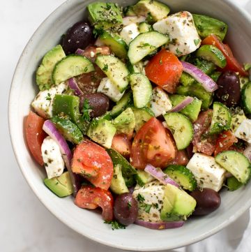 This avocado Greek salad recipe is healthy, fast, and bursting with fresh Mediterranean flavors. This salad is delicious and good for you!