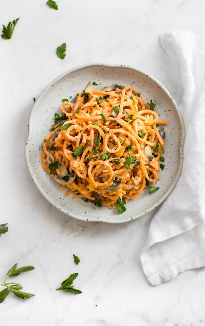 spiralized creamy mushroom sweet potato noodles on a plate