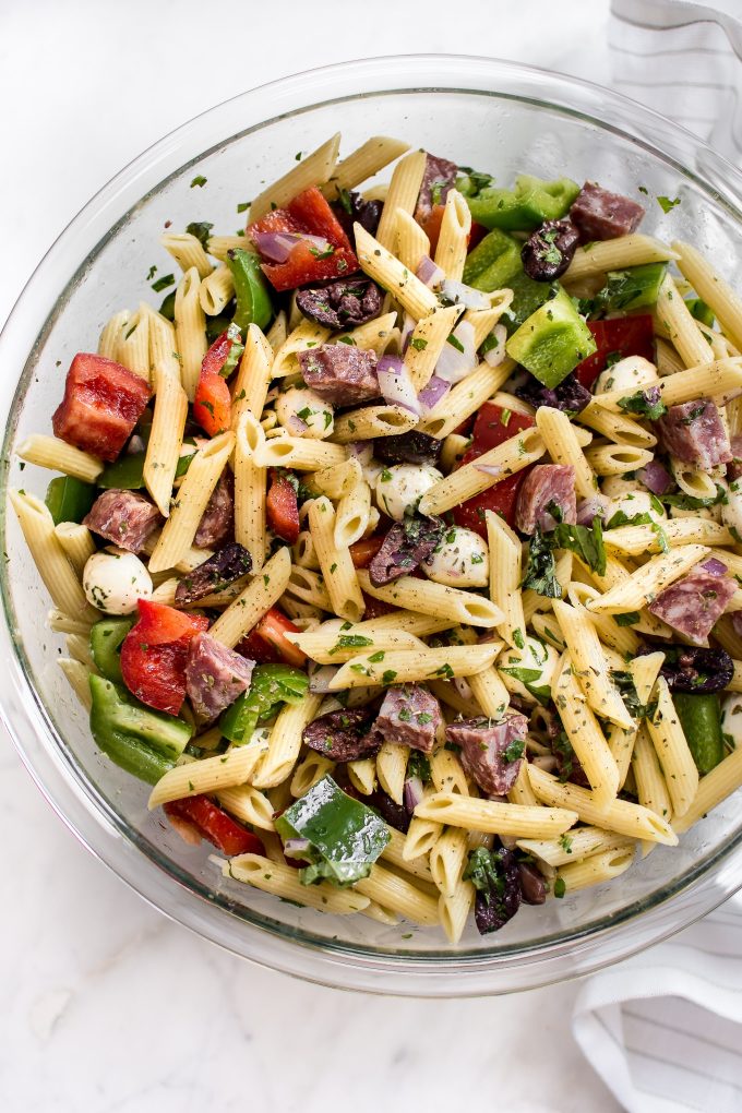 Italian cold pasta salad in a glass bowl