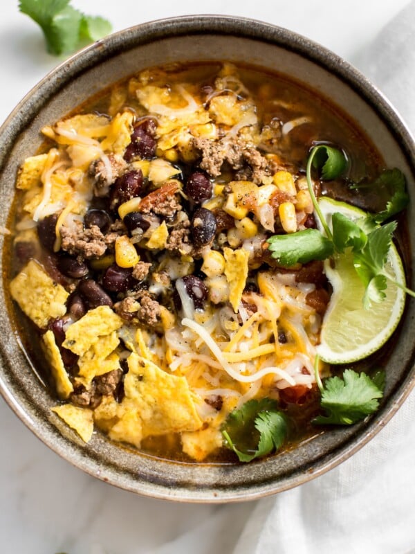 This Instant Pot taco soup recipe is healthy, hearty, and delicious. Add your favorite toppings and it makes a fantastic meal!