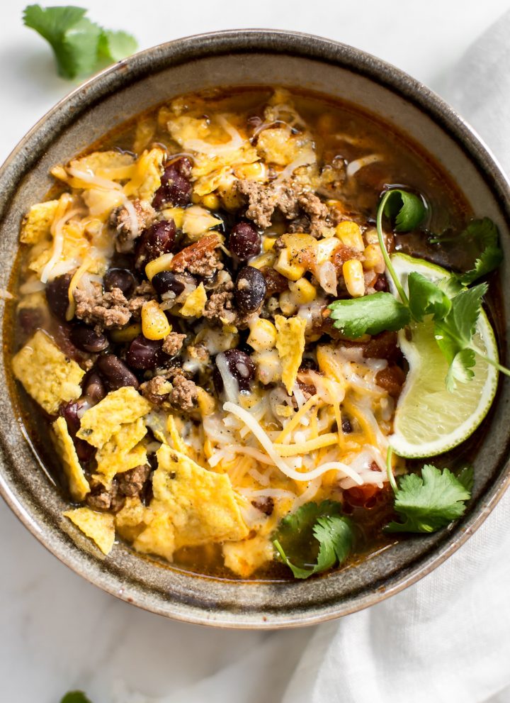 This Instant Pot taco soup recipe is healthy, hearty, and delicious. Add your favorite toppings and it makes a fantastic meal!