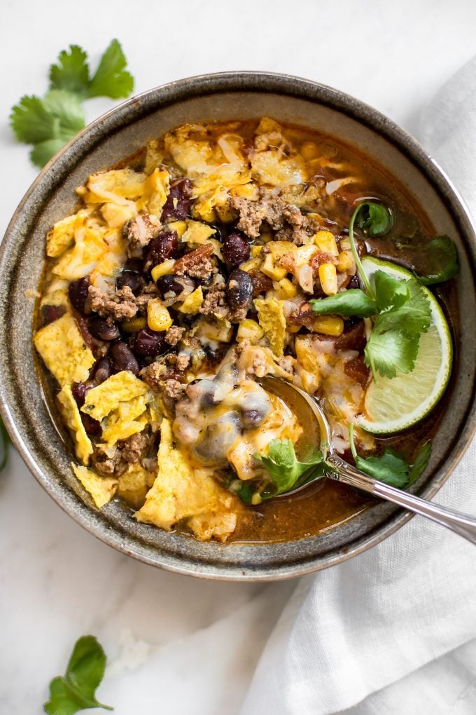 close-up of bowl of Instant Pot taco soup with a spoon