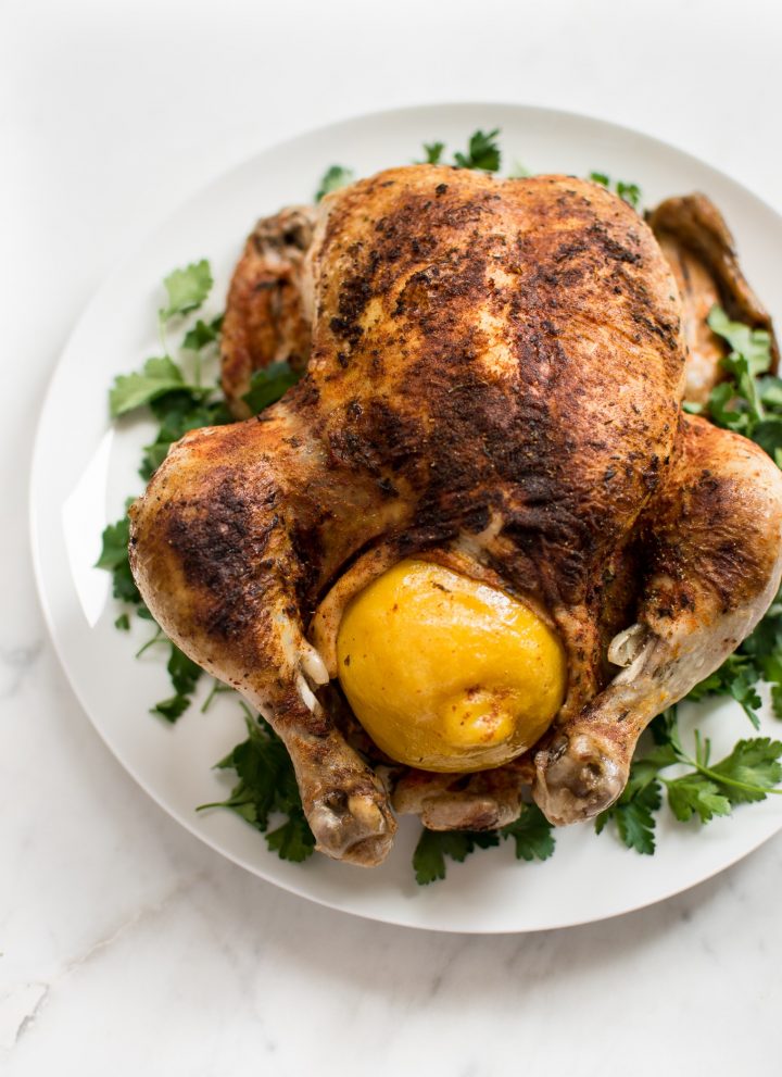 This easy Instant Pot whole chicken recipe is fast, simple, healthy, and makes the best tender chicken. This electric pressure cooker whole chicken is great for a family dinner or to have chicken meat ready for meals throughout the week! The chicken can be stuffed with lemon for extra flavor. Use the leftovers to make stock or bone broth. You can even use frozen chicken in this recipe.