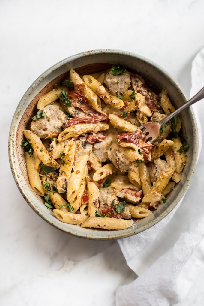 easy Cajun sausage pasta in a bowl with a fork