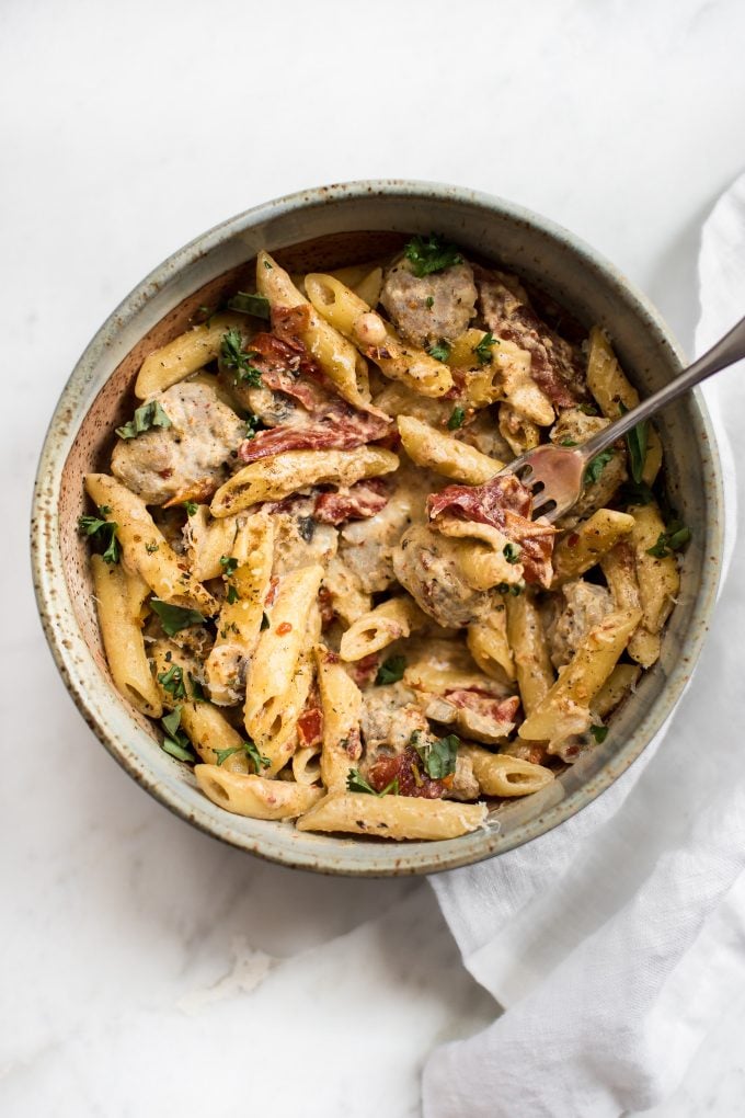 easy Cajun sausage pasta in a bowl with a fork