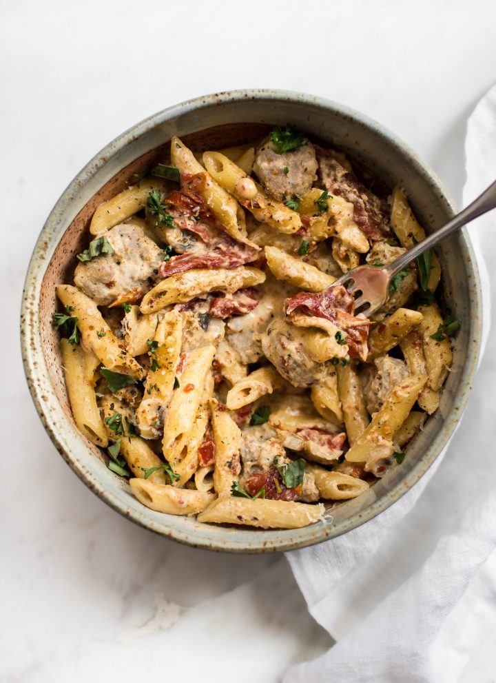 This easy one pot Cajun sausage pasta recipe is flavorful comfort food at its best! Ready in just over half an hour. Perfect for a weeknight dinner. 