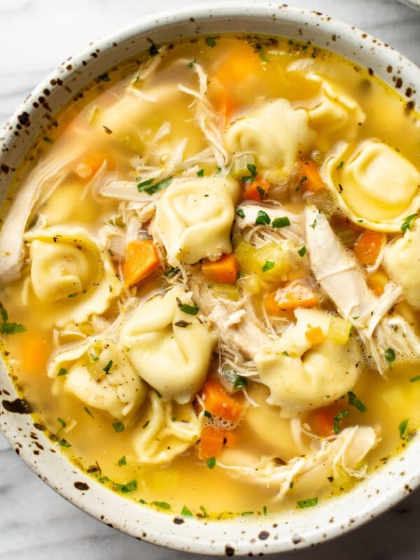 a bowl of chicken tortellini soup