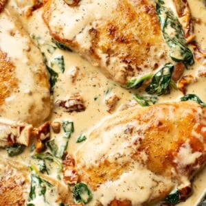 closeup of creamy tuscan chicken in a skillet