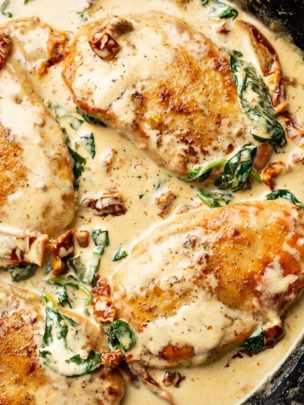 closeup of creamy tuscan chicken in a skillet